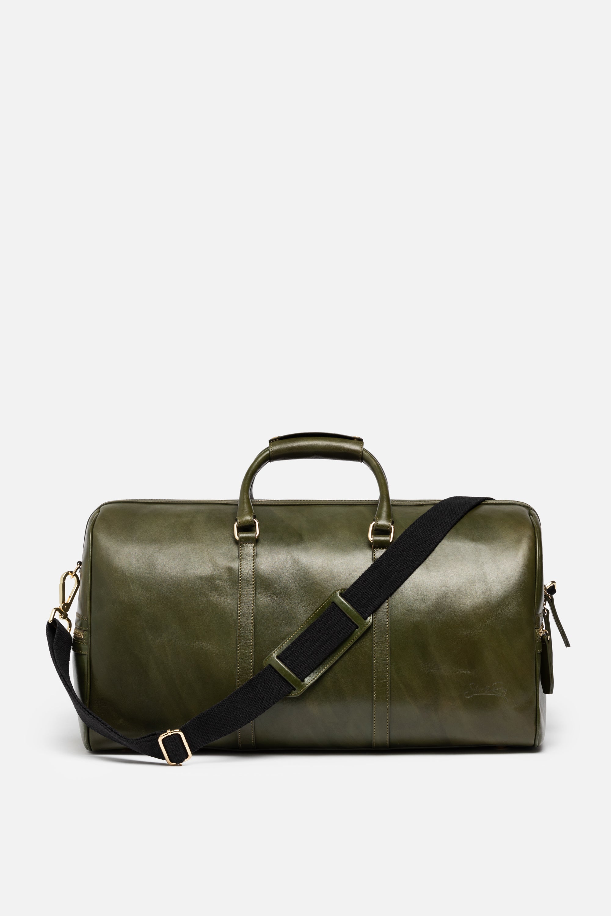 green leather duffle bag